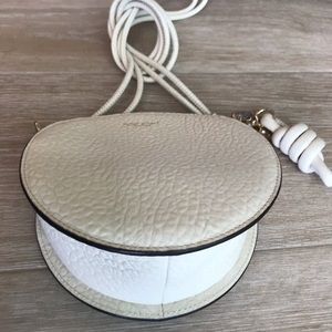 Henri Bendel round cream leather crossbody
